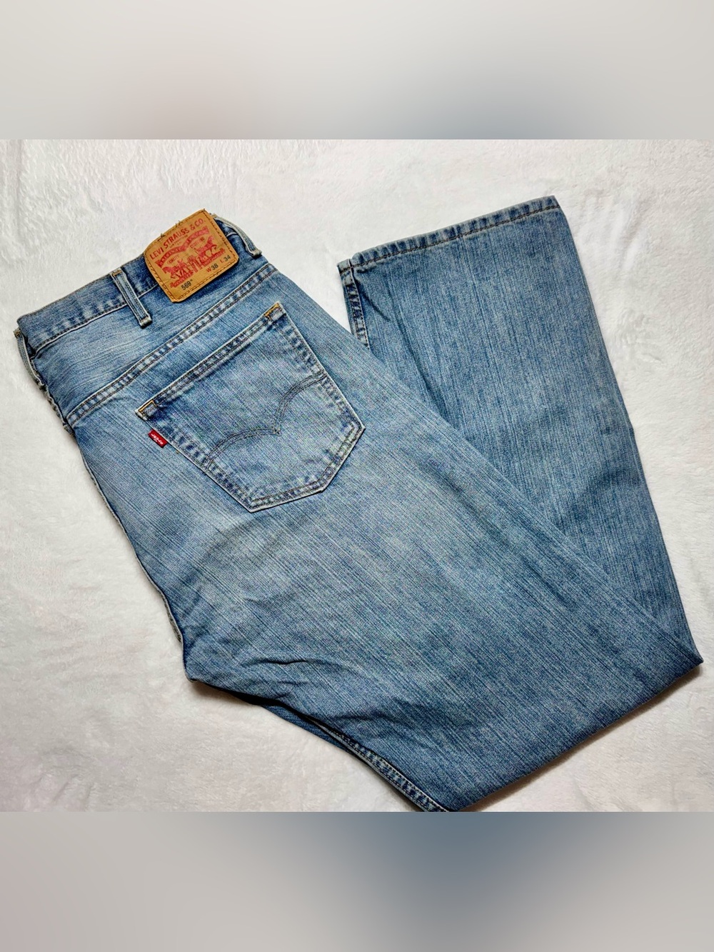 569 Levi's Men's Blue Light Wash Denim Straight Jeans Loose Fit